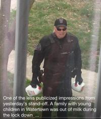 Boston police officer delivering milk